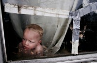 Matt_Eich, boy at window